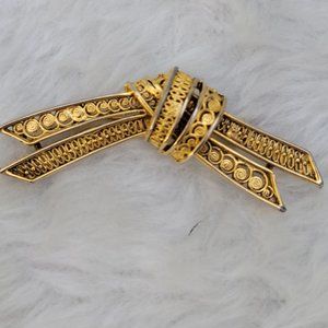 vintage gold tone fretwork knot brooch